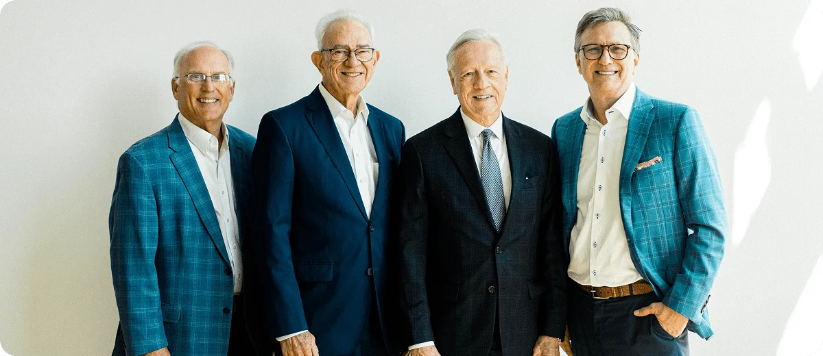 Executive leadership team posing together in a bright studio in Clemmons, NC – Birch Stream Digital